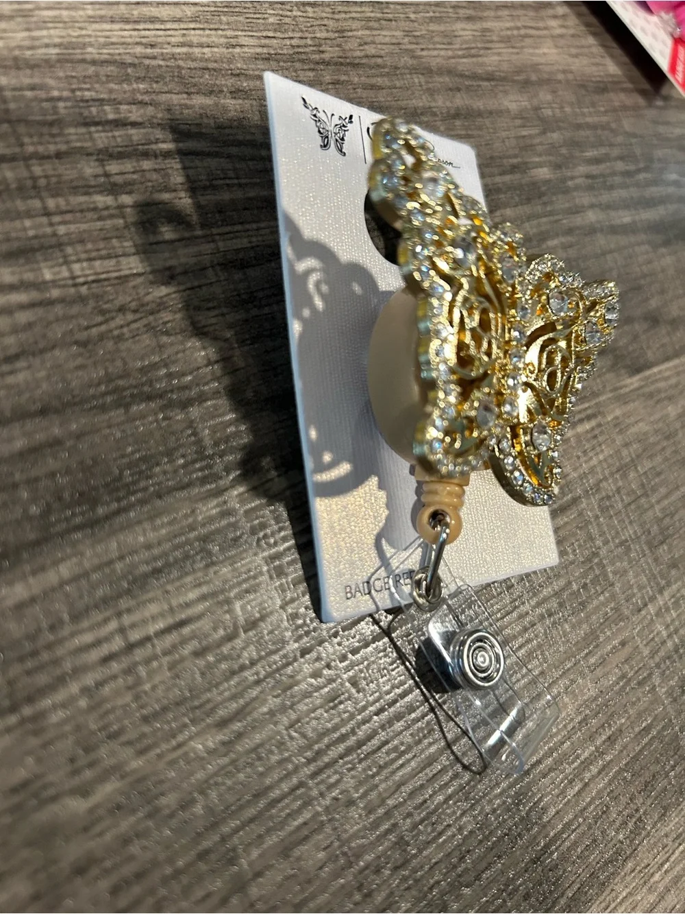 Jessica Simpson Gold and Clear Crystal Butterfly Badge Reel